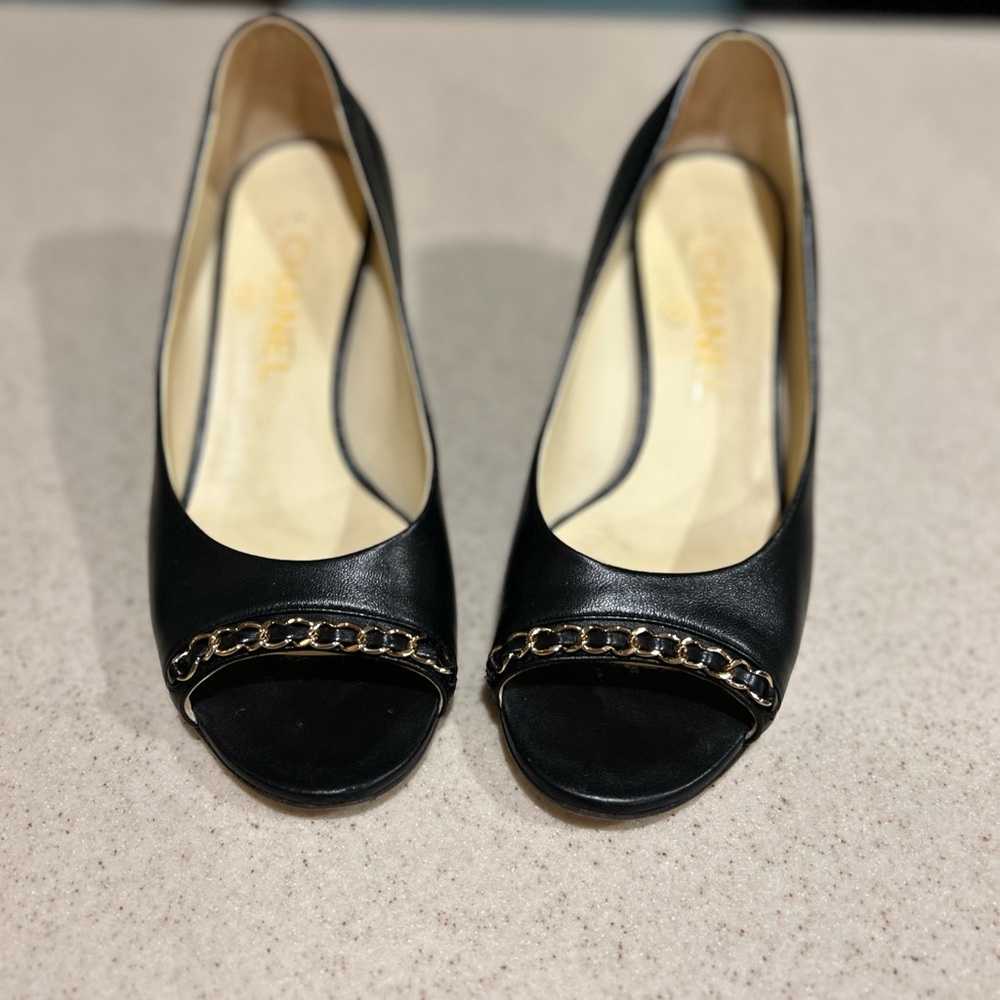 Chanel Leather Pumps Open Toe.Interlocking CC logo and gold chain link accent.